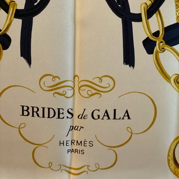 Hermès NIB Silk Lg (90)
Brides de Gala Scarf.
No callouts! Blue trim - Picture 2 of 7